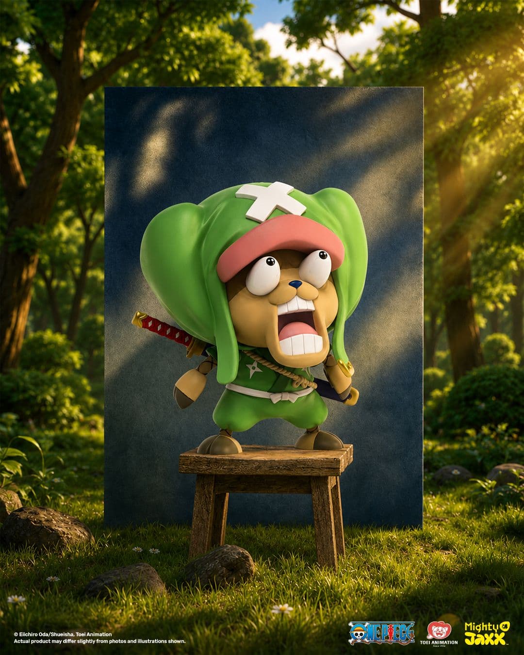 PVC figure Chopper figure in green hooded cloak, startled expression, standing on wooden stool outdoors.