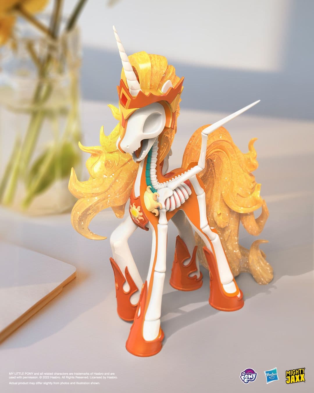 Daybreaker collectible on display with glittering orange mane and metallic flame details, showcased indoors.