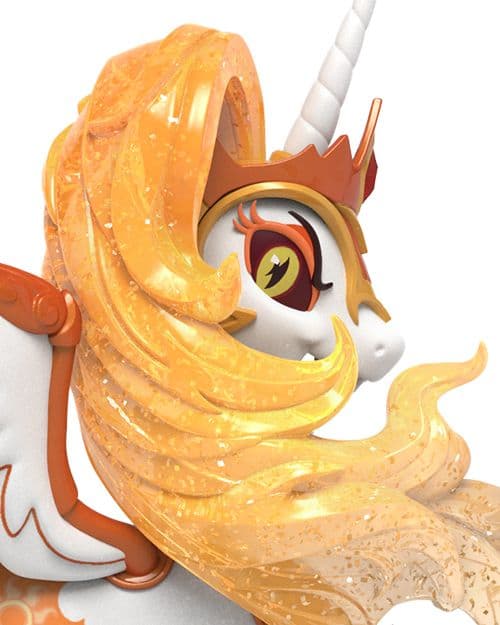 Close-up of Daybreaker’s glittering orange mane, gold crown, and fiery eye detail from the XXRAY+ dissected design.